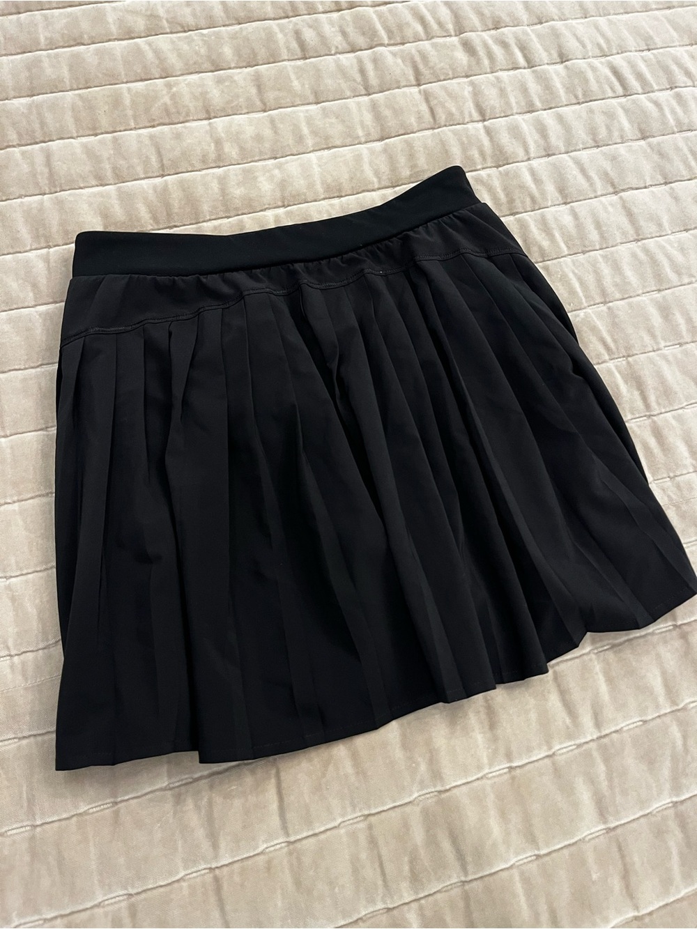 SPANX Women's Black Pleated Athletic Mini Skirt with shorts